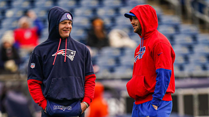 Jan 5, 2025; Foxborough, Massachusetts, USA; Buffalo Bills quarterback Josh Allen (17) and New England Patriots quarterback Drake Maye (10) talk on the field