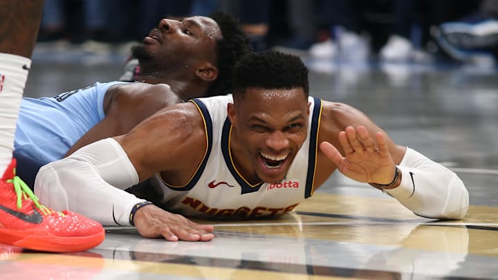 Nuggets guard Westbrook reacts as he lays on the court against the Memphis Grizzlies.