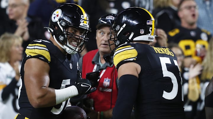 Sep 18, 2023; Pittsburgh, Pennsylvania, USA;  Pittsburgh Steelers linebacker Alex Highsmith (56) celebrates his pick six interception touchdown with linebacker Nick Herbig (51) against the Cleveland Browns during the first quarter at Acrisure Stadium. Mandatory Credit: Charles LeClaire-Imagn Images