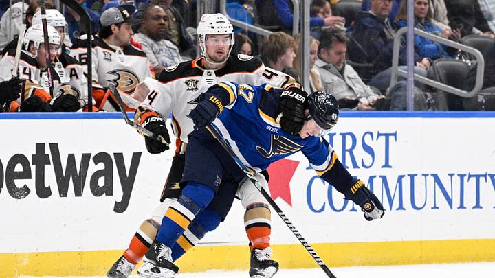 Mar 17, 2024; St. Louis, Missouri, USA; Anaheim Ducks left wing Ross Johnston (44) bothers St. Louis Blues defenseman Torey Krug (47) during the first period at Enterprise Center. Mandatory Credit: Jeff Le-USA TODAY Sports