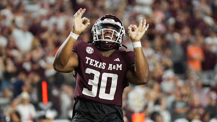 Aug 30, 2025; College Station, Texas, USA; Texas A&M Aggies defensive end Solomon Williams (30) celebrates during the second half against the UTSA Roadrunners at Kyle Field. Mandatory Credit: Sean Thomas-Imagn Images