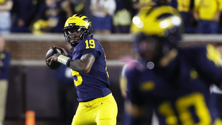 Michigan quarterback Bryce Underwood drops back to pass in the Wolverines' contest against New Mexico. Michigan quarterback Bryce Underwood drops back to pass in the Wolverines' contest against New Mexico.