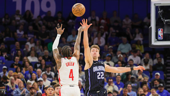 Houston Rockets guard Jalen Green (4) shoots against Orlando Magic forward Franz Wagner (22) during the first quarter at Kia Center. Houston Rockets guard Jalen Green (4) shoots against Orlando Magic forward Franz Wagner (22) during the first quarter at Kia Center.