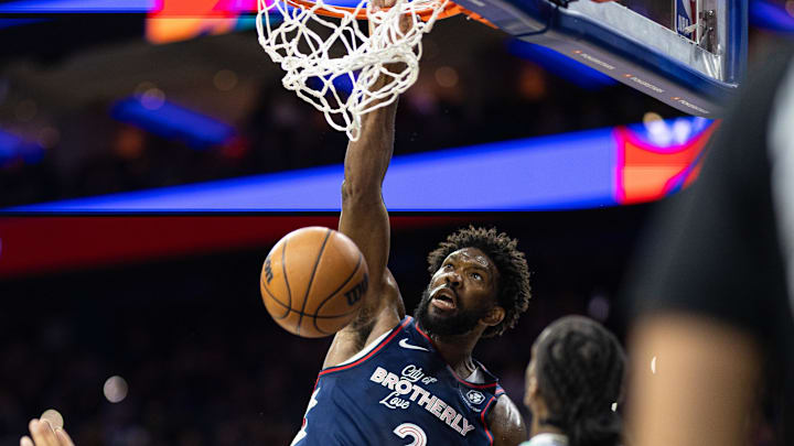 Dec 20, 2023; Philadelphia, Pennsylvania, USA; Philadelphia 76ers center Joel Embiid (21) dunks the ball against the Minnesota Timberwolves during the third quarter at Wells Fargo Center. Mandatory Credit: Bill Streicher-Imagn Images