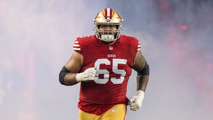San Francisco 49ers guard Aaron Banks (65) before a 2024 NFC divisional round game against the Green Bay Packers.