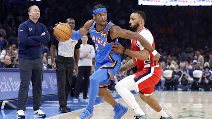 Jan 2, 2025; Oklahoma City, Oklahoma, USA; Oklahoma City Thunder guard Shai Gilgeous-Alexander (2) dribbles around Los Angeles Clippers guard Norman Powell (24) during the first quarter at Paycom Center. Mandatory Credit: Alonzo Adams-Imagn Images Jan 2, 2025; Oklahoma City, Oklahoma, USA; Oklahoma City Thunder guard Shai Gilgeous-Alexander (2) dribbles around Los Angeles Clippers guard Norman Powell (24) during the first quarter at Paycom Center. Mandatory Credit: Alonzo Adams-Imagn Images