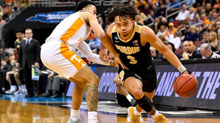 Mar 28, 2019; Louisville, KY, United States; Purdue Boilermakers guard Carsen Edwards (3) works around Tennessee Volunteers guard Lamonte Turner (1) during the first half in the semifinals of the south regional of the 2019 NCAA Tournament at KFC Yum Center. Mandatory Credit: Jamie Rhodes-USA TODAY Sports Mar 28, 2019; Louisville, KY, United States; Purdue Boilermakers guard Carsen Edwards (3) works around Tennessee Volunteers guard Lamonte Turner (1) during the first half in the semifinals of the south regional of the 2019 NCAA Tournament at KFC Yum Center. Mandatory Credit: Jamie Rhodes-USA TODAY Sports
