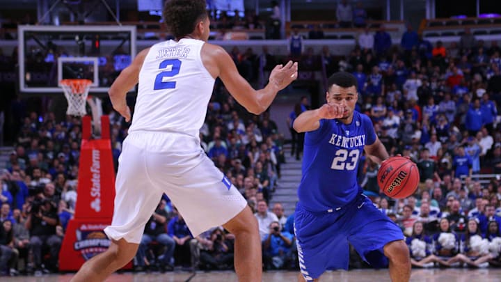 Nov 17, 2015; Chicago, IL, USA; Kentucky Wildcats guard Jamal Murray (23) is defended by Duke Blue Devils forward Chase Jeter (2) during the second half at the United Center. Kentucky won 74-63. Mandatory Credit: Dennis Wierzbicki-Imagn Images