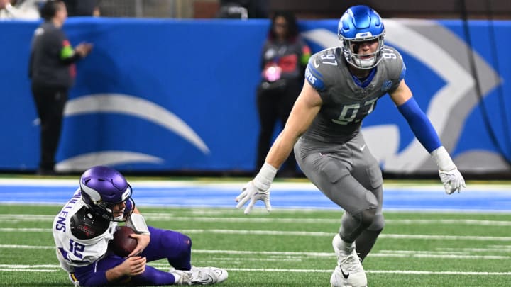 Jan 7, 2024; Detroit, Michigan, USA; Detroit Lions defensive end Aidan Hutchinson (97) celebrates after sacking Minnesota Vikings quarterback Nick Mullens (12) in the second quarter at Ford Field. Mandatory Credit: Lon Horwedel-USA TODAY Sports Jan 7, 2024; Detroit, Michigan, USA; Detroit Lions defensive end Aidan Hutchinson (97) celebrates after sacking Minnesota Vikings quarterback Nick Mullens (12) in the second quarter at Ford Field. Mandatory Credit: Lon Horwedel-USA TODAY Sports