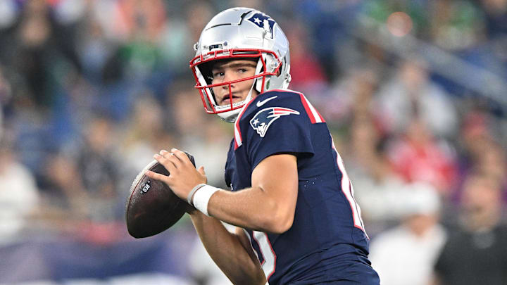 Aug 15, 2024; Foxborough, Massachusetts, USA; New England Patriots quarterback Drake Maye (10) looks to throw against the Philadelphia Eagles during the first half at Gillette Stadium. Mandatory Credit: Brian Fluharty-Imagn Images
