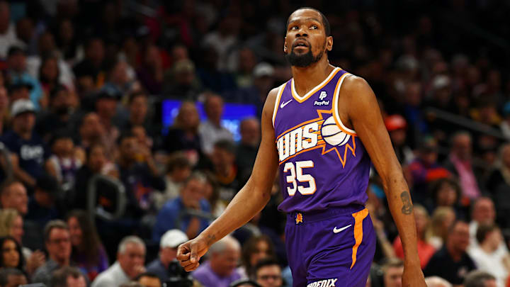Apr 9, 2024; Phoenix, Arizona, USA;  Phoenix Suns forward Kevin Durant (35) walks off the court during the first quarter of the game against the LA Clippers at Footprint Center. Mandatory Credit: Mark J. Rebilas-Imagn Images