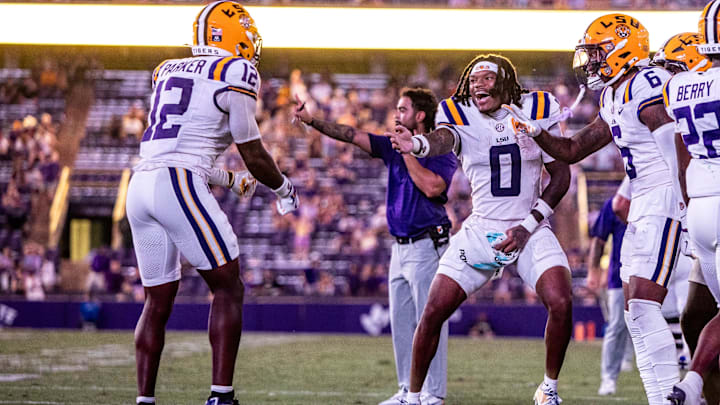 Sep 20, 2025; Baton Rouge, Louisiana, USA;  LSU Tigers wide receiver Kyle Parker (12) reacts to scoring a touchdown against the Southeastern Louisiana Lions during the second half at Tiger Stadium. Mandatory Credit: Stephen Lew-Imagn Images