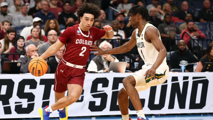 Mar 22, 2024; Memphis, TN, USA; Colgate Raiders guard Braeden Smith (2) dribbles against Baylor Bears guard Ja'Kobe Walter (4) during the second half of the NCAA Tournament First Round at FedExForum. Mandatory Credit: Petre Thomas-USA TODAY Sports