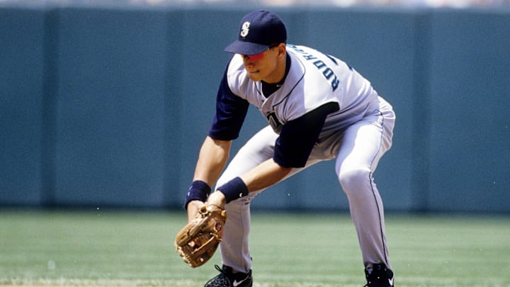 Seattle Mariners shortstop Alex Rodriguez fields a ground ball during a game against the Baltimore Orioles in 1998 at Camden Yards.