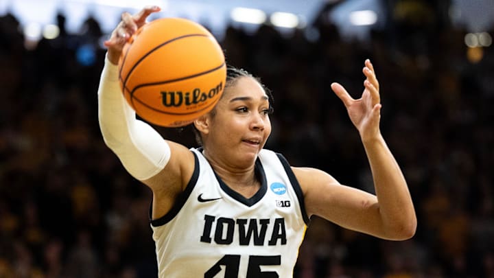 Iowa forward Hannah Stuelke (45) reaches for a loose ball March 23, 2026 during a Round of 32 NCAA March Madness game against the Virginia Cavaliers at Carver-Hawkeye Arena in Iowa City, Iowa.
