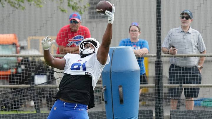 Bills defensive lineman Ed Oliver stretches out for the ball during position drills simulating an interception opportunity during day six of Buffalo Bills training camp at St. John Fisher University Thursday, August 5, 2026 in Pittsford. Bills defensive lineman Ed Oliver stretches out for the ball during position drills simulating an interception opportunity during day six of Buffalo Bills training camp at St. John Fisher University Thursday, August 5, 2026 in Pittsford.