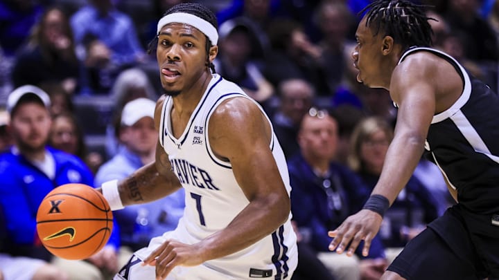 Mar 8, 2025; Cincinnati, Ohio, USA; Xavier Musketeers guard Ryan Conwell (7) dribbles against the Providence Friars in the first half at Cintas Center. Mandatory Credit: Katie Stratman-Imagn Images