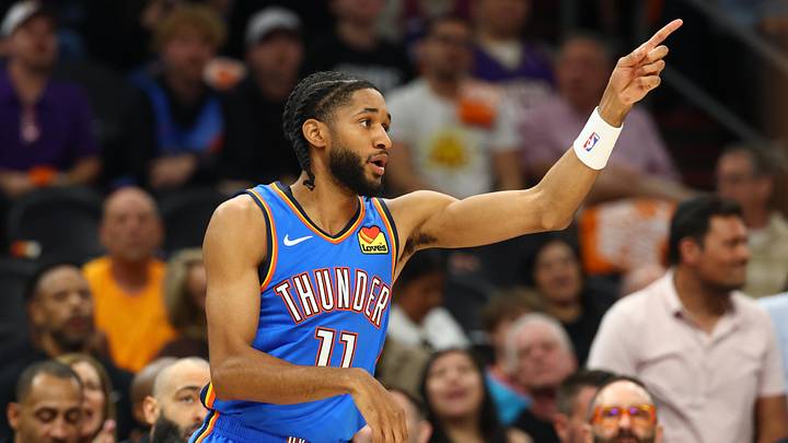 Apr 27, 2026; Phoenix, Arizona, USA; Oklahoma City Thunder guard Isaiah Joe (11) celebrates a shot against the Phoenix Suns in the first half during game four of the first round of the 2026 NBA Playoffs at Mortgage Matchup Center. Mandatory Credit: Mark J. Rebilas-Imagn Images
