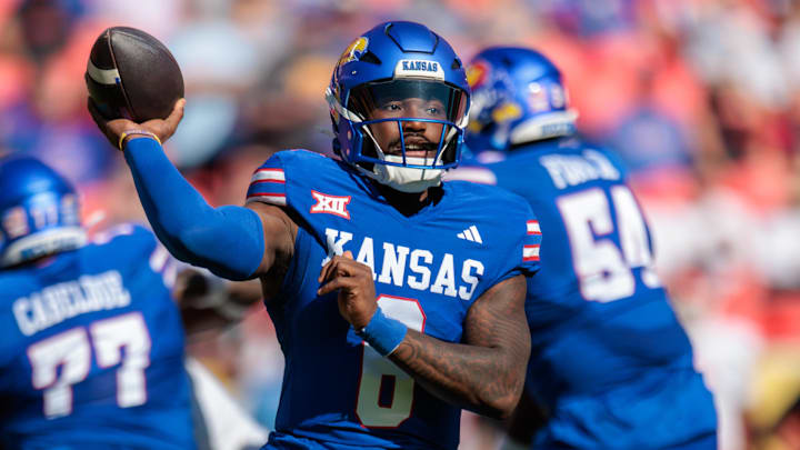 Oct 19, 2024; Kansas City, Missouri, USA; Kansas Jayhawks quarterback Jalon Daniels (6) passes the ball against the Houston Cougars during the first quarter at GEHA Field at Arrowhead Stadium. Mandatory Credit: William Purnell-Imagn Images