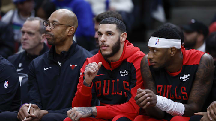 Oct 16, 2024; Chicago, Illinois, USA; Chicago Bulls guard Lonzo Ball (2) sits on the bench during the first half of a game against the Minnesota Timberwolves at United Center. 