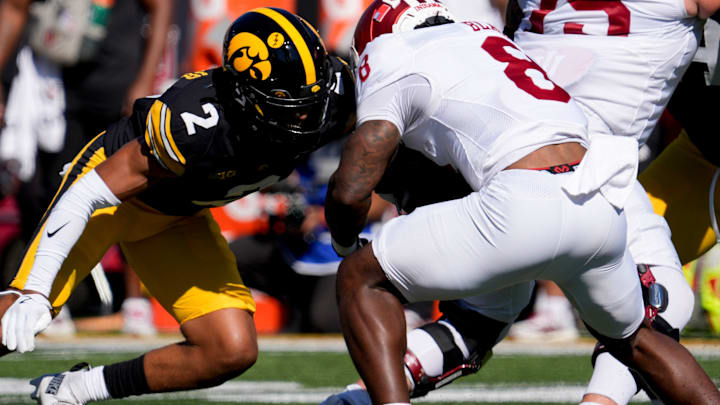 Iowa Hawkeyes defensive back TJ Hall (2) tackles Indiana Hoosiers running back Kaelon Black (8) Iowa Hawkeyes defensive back TJ Hall (2) tackles Indiana Hoosiers running back Kaelon Black (8)