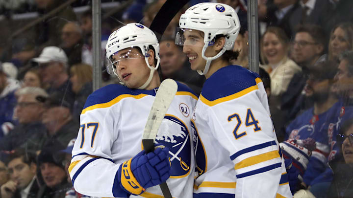 Nov 27, 2023; New York, New York, USA; Buffalo Sabres right wing John-Jason Peterka (77) celebrates his goal against the New York Rangers with center Dylan Cozens (24) during the first period at Madison Square Garden. Mandatory Credit: Danny Wild-Imagn Images