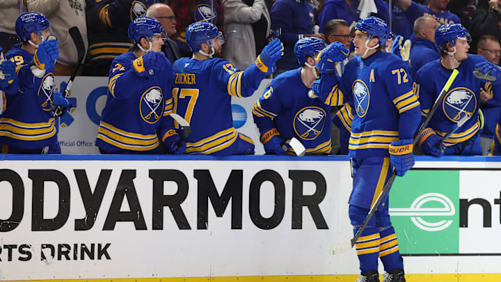 Buffalo Sabres center Tage Thompson celebrates with teammates
