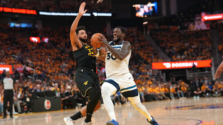 Minnesota Timberwolves forward Julius Randle drives past Golden State Warriors forward Trayce Jackson-Davis in the second quarter during Game 4 of their Western Conference semifinal at Chase Center in San Francisco on May 12, 2025.