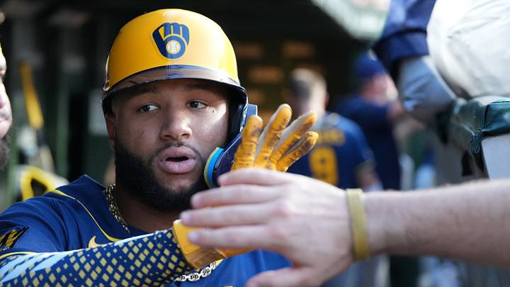 Sep 2, 2026; Chicago, Illinois, USA;  Milwaukee Brewers left fielder Jackson Chourio (11) is greeted in the dugout after hitting a home run against the Chicago Cubs at Wrigley Field.  Mandatory Credit: David Banks-Imagn Images