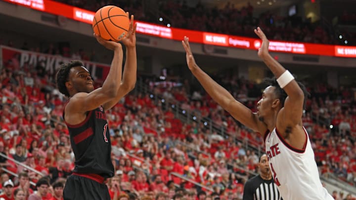 Mar 7, 2026; Raleigh, North Carolina, USA; Stanford Cardinal guard Ebuka Okorie (1) shoots the ball against NC State Wolfpack guard Paul McNeil Jr. (2) during the second half at Lenovo Center. Mandatory Credit: Zachary Taft-Imagn Images Mar 7, 2026; Raleigh, North Carolina, USA; Stanford Cardinal guard Ebuka Okorie (1) shoots the ball against NC State Wolfpack guard Paul McNeil Jr. (2) during the second half at Lenovo Center. Mandatory Credit: Zachary Taft-Imagn Images