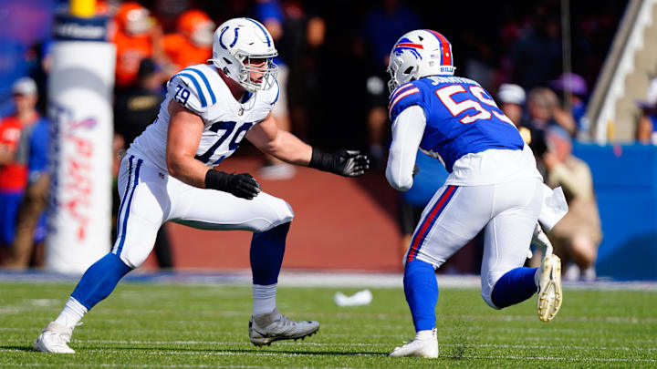 Aug 13, 2022; Orchard Park, New York, USA; Indianapolis Colts offensive tackle Bernhard Raimann blocks Buffalo Bills defensive end Kingsley Jonathan (59) during the first half at Highmark Stadium. 