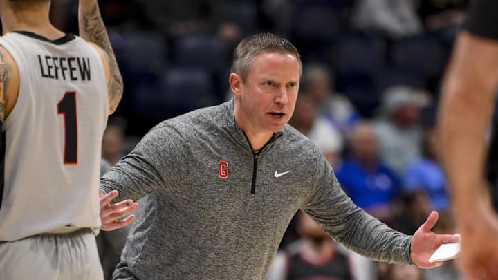 Mar 12, 2025; Nashville, TN, USA; Georgia Bulldogs head coach Mike White reacts to a called foul against the Oklahoma Sooners during the second half at Bridgestone Arena. Mandatory Credit: Steve Roberts-Imagn Images Mar 12, 2025; Nashville, TN, USA; Georgia Bulldogs head coach Mike White reacts to a called foul against the Oklahoma Sooners during the second half at Bridgestone Arena. Mandatory Credit: Steve Roberts-Imagn Images
