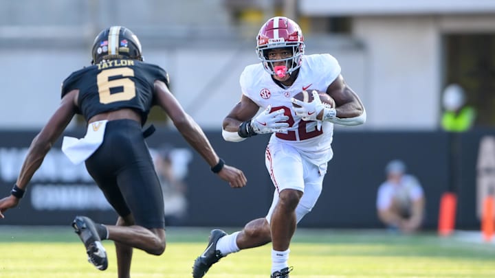 Oct 5, 2024; Nashville, Tennessee, USA;  Alabama Crimson Tide running back Jam Miller (26) runs the ball against the Vanderbilt Commodores during the first half at FirstBank Stadium. Mandatory Credit: Steve Roberts-Imagn Images