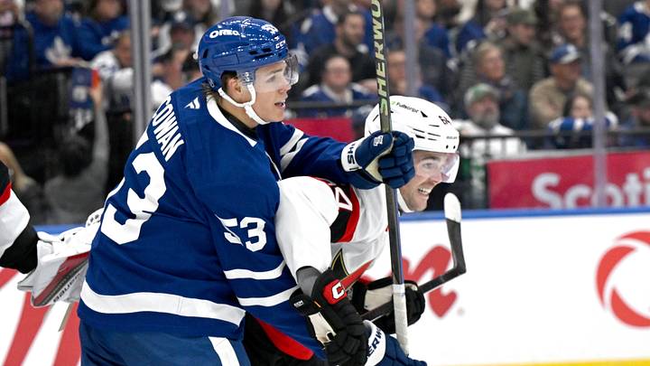 Sep 23, 2026; Toronto, Ontario, CAN;  Toronto Maple Leafs forward Easton Cowan (53) battles for position with Ottawa Senators defenseman Scott harrington (64) in the first period at Scotiabank Arena.  Mandatory Credit: Dan Hamilton-Imagn Images