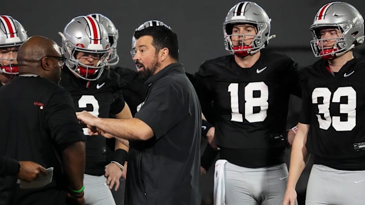 Mar 7, 2024; Columbus, OH, USA; Ohio State Buckeyes head coach Ryan Day talks to quarterbacks during