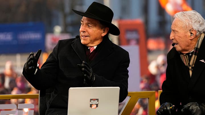 Nick Saban and Lee Corso talk on the set of ESPN College GameDay prior to the College Football Playoff first round game between the Ohio State Buckeyes and Tennessee Volunteers in Columbus, Ohio