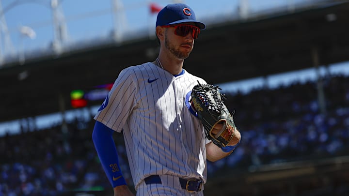 Aug 21, 2025; Chicago, Illinois, USA; Chicago Cubs right fielder Kyle Tucker (30) walks back to the dugout during the fifth inning of a baseball game against the Milwaukee Brewers at Wrigley Field. Mandatory Credit: Kamil Krzaczynski-Imagn Images