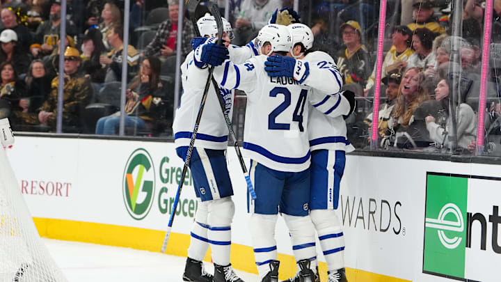 Jan 15, 2026; Las Vegas, Nevada, USA; Toronto Maple Leafs center Scott Laughton (24) celebrates with team mates after scoring a goal against the Vegas Golden Knights during the third period at T-Mobile Arena. Mandatory Credit: Stephen R. Sylvanie-Imagn Images