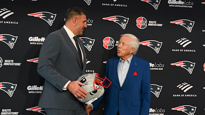 Jan 13, 2025; Foxborough, MA, USA; Mike Vrabel (l) poses for a photo with New England Patriots owner Robert Kraft (r) after a press conference at Gillette Stadium to introduce him as the Patriots new head coach . Mandatory Credit: Eric Canha-Imagn Images
