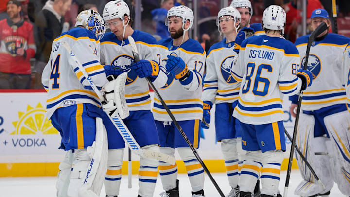 Feb 2, 2026; Sunrise, Florida, USA; Buffalo Sabres center Ryan McLeod (71) celebrates with goaltender Alex Lyon (34) after the game against the Florida Panthers at Amerant Bank Arena. Mandatory Credit: Sam Navarro-Imagn Images