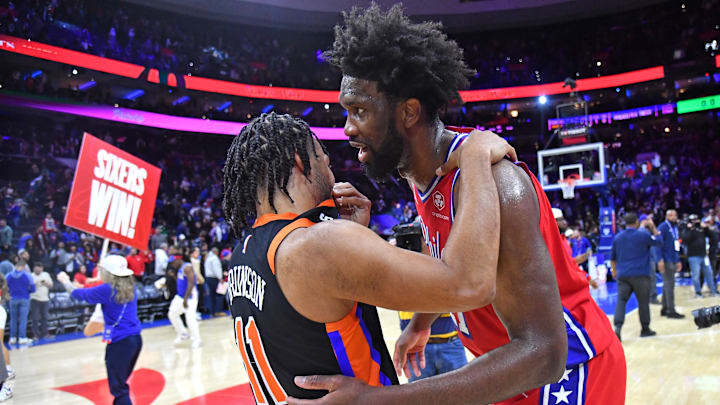 Feb 10, 2023; Philadelphia, Pennsylvania, USA; Philadelphia 76ers center Joel Embiid (21) with New