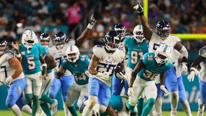 Tennessee Titans running back Tony Pollard (20) runs with the football against the Miami Dolphins during the third quarter at Hard Rock Stadium. Tennessee Titans running back Tony Pollard (20) runs with the football against the Miami Dolphins during the third quarter at Hard Rock Stadium.