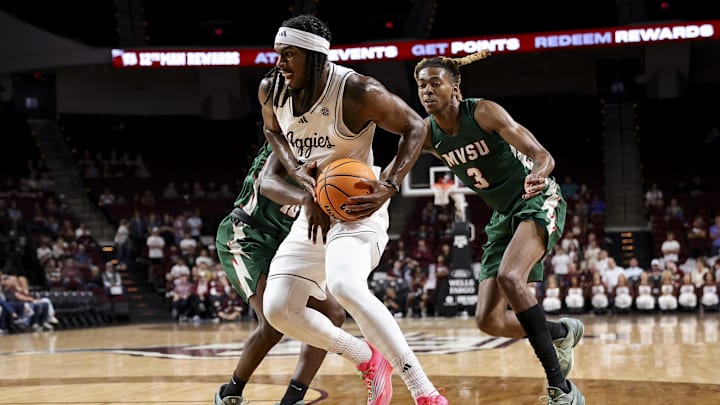 Texas A&M Aggies forward Mackenzie Mgbako (21) is double-teamed by the Mississippi Valley State Delta Devils during the first half at Reed Arena.