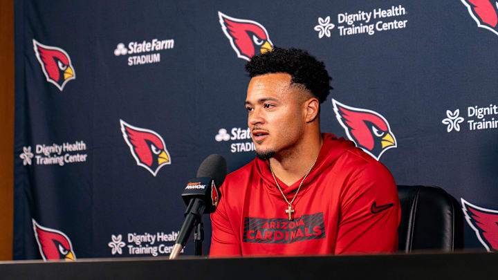 Tyler Allgeier speaks to members of the media at Arizona Cardinals Training Center in Tempe, on March 12, 2026.