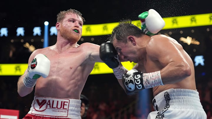 Sep 17, 2022; Las Vegas, Nevada, USA; Canelo Alvarez (red trunks) and Gennadiy Golovkin (white trunks) box during a super middleweight championship bout at T-Mobile Arena. Mandatory Credit: Joe Camporeale-Imagn Images
