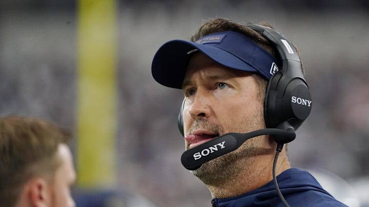 Sep 14, 2025; Arlington, Texas, USA; Dallas Cowboys head coach Brian Schottenheimer looks on during the first quarter at AT&T Stadium. Mandatory Credit: Raymond Carlin III-Imagn Images