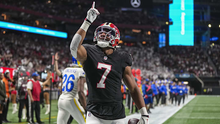 Dec 29, 2025; Atlanta, Georgia, USA; Atlanta Falcons running back Bijan Robinson (7) reacts after catching a touchdown pass against the Los Angeles Rams during the first quarter at Mercedes-Benz Stadium. Mandatory Credit: Dale Zanine-Imagn Images