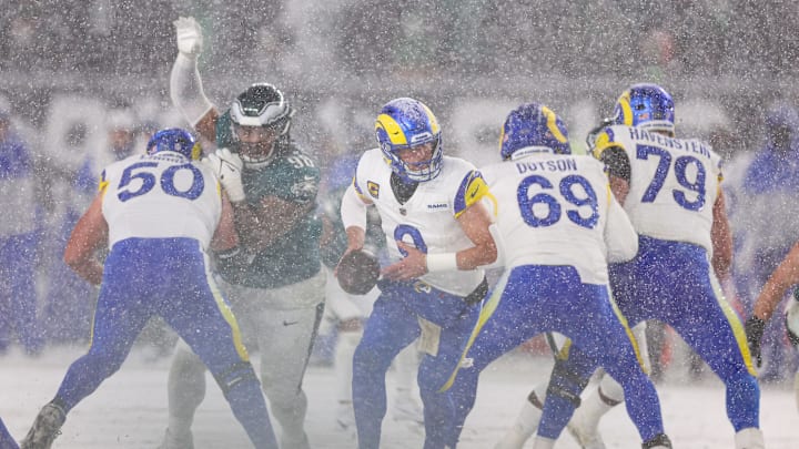 Jan 19, 2025; Philadelphia, Pennsylvania, USA; Los Angeles Rams quarterback Matthew Stafford (9) in action against the Philadelphia Eagles in a 2025 NFC divisional round game at Lincoln Financial Field. Mandatory Credit: Bill Streicher-Imagn Images
