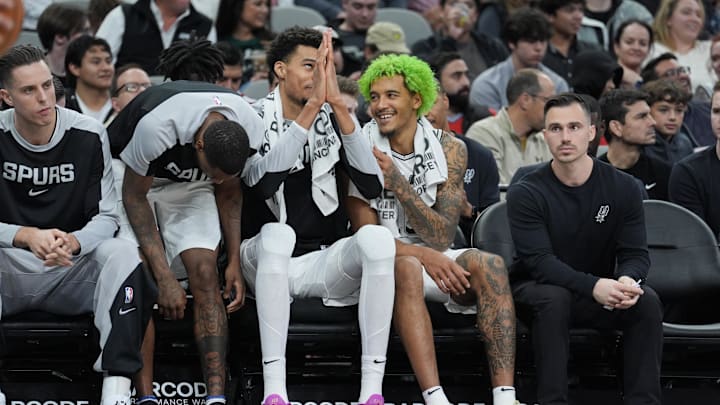 Dec 21, 2024; San Antonio, Texas, USA;  San Antonio Spurs center Victor Wembanyama (1) and forward Jeremy Sochan (10) on the bench in the second half against the Portland Trail Blazers at Frost Bank Center. Mandatory Credit: Daniel Dunn-Imagn Images