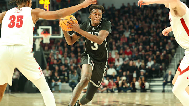Jan 29, 2025; Starkville, Mississippi, USA; Mississippi State Bulldogs forward KeShawn Murphy (3) drives to the basket against Alabama Crimson Tide forward Derrion Reid (35) during the second half at Humphrey Coliseum. Mandatory Credit: Wesley Hale-Imagn Images